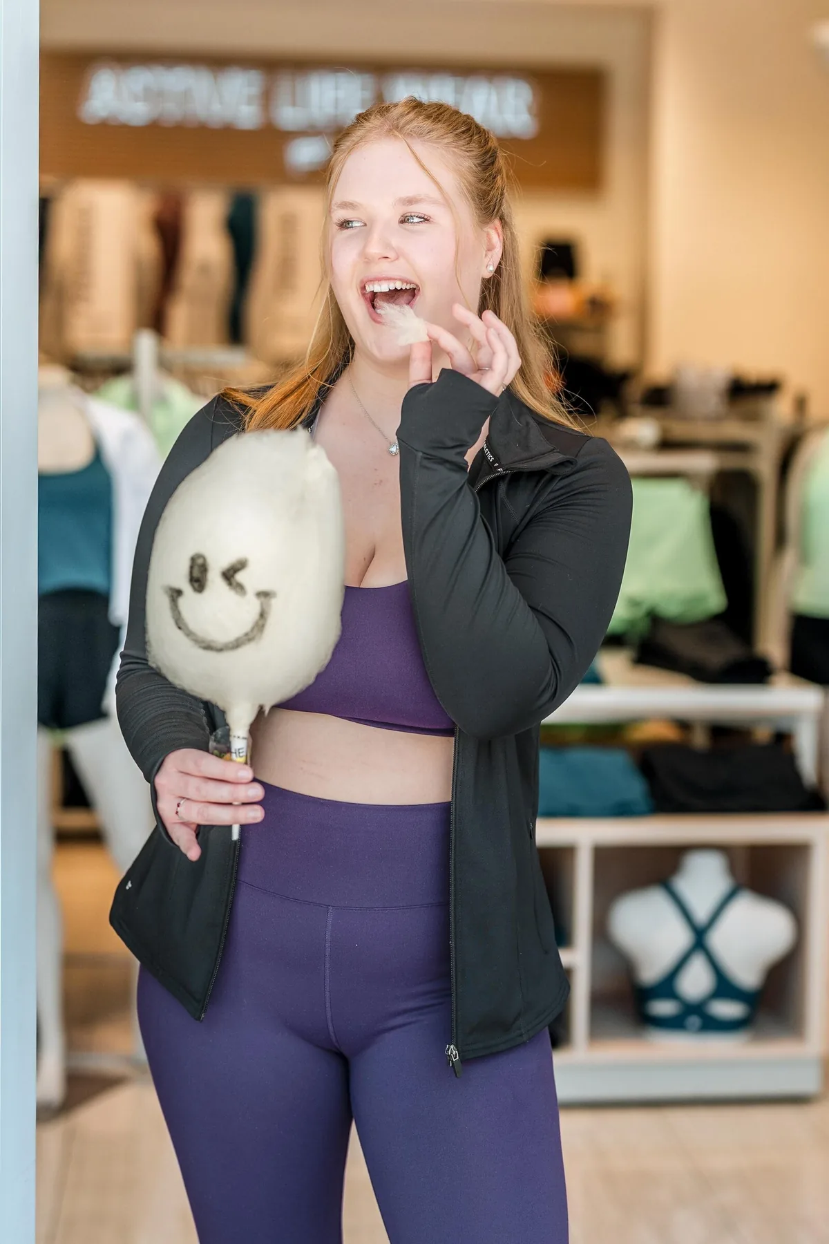 Guest interacting with a branded retail product activation experience in Orlando